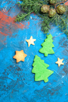 top view little tree figures on a blue background color christmas holiday new year photo
