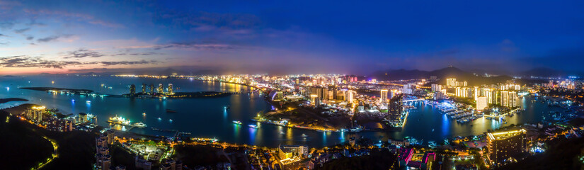 Fototapeta na wymiar Aerial photography of the night view of the urban architectural landscape of Sanya, China