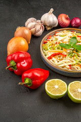 front view delicious vegetable salad with seasonings and fresh vegetables on a grey background diet health color photo ripe salad food