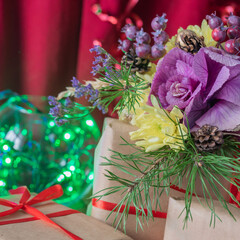 Christmas composition with bouquet and gift boxes