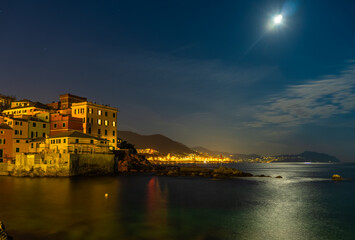 Moonlight view of the ancient fishing village in Genoa, Ligurian sea, Italy.
