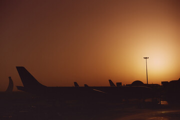 Fototapeta na wymiar Abu Dhabi airport at sunset