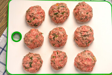 Cooking meat cutlets with herbs