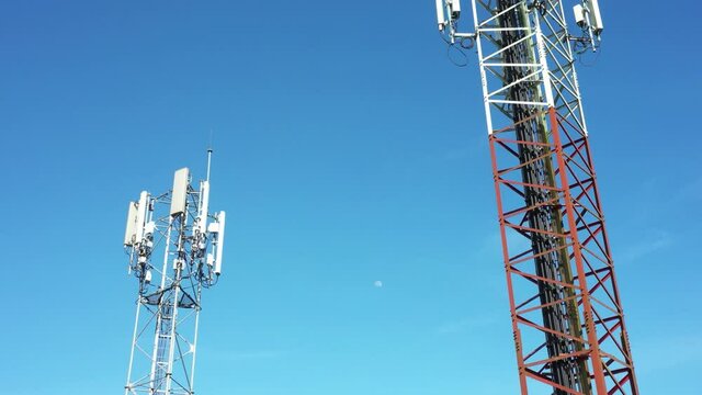 Footage 4k B-roll Aerial drone view of tower antennas Telecommunication cell phone, radio transmitters of cellular 5g 4g mobile and smartphones