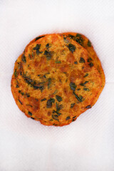 Delicious Indian Masala Puri or Methi Puri. Indian Bread Made of fenugreek leaves.