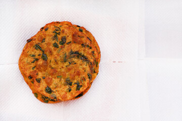 Delicious Indian Masala Puri or Methi Puri. Indian Bread Made of fenugreek leaves.