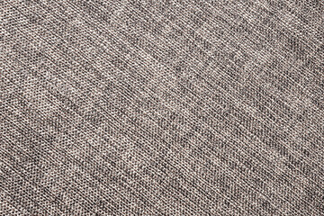 Gray fabric background. Grey canvas texture. Bright textile material background. Gray fiber pattern. Checkered textile texture.