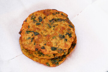Delicious Indian Masala Puri or Methi Puri. Indian Bread Made of fenugreek leaves.