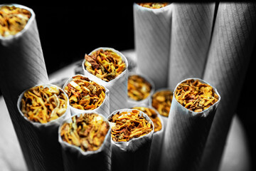 A pack of white cigarettes photographed close-up - 399766673