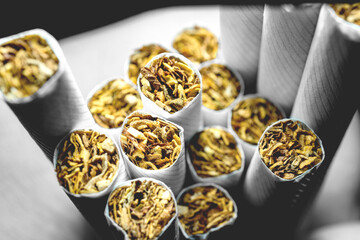 A pack of white cigarettes photographed close-up - 399766863