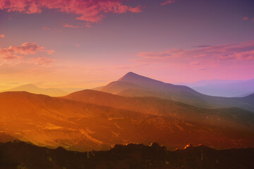 Beautiful sunset from the tops of the mountains of the Carpathians in spring.