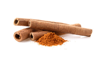 cinnamon sticks stacked on white background