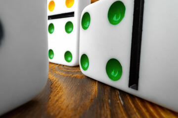 Close up of white dice on wooden background