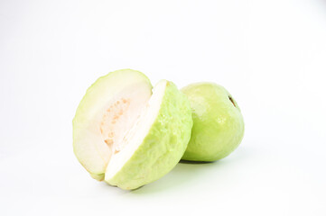 Guava fruit with sliced on wooden plate over white background.
