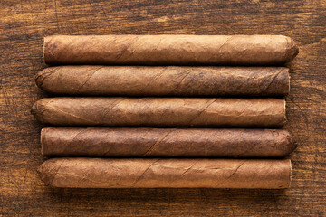 cigars on a warm wooden background, Good texture of men's club or goods sales.