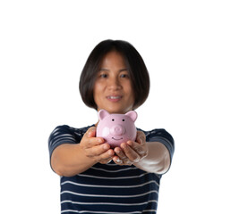 Fototapeta na wymiar The piggy bank is in the hands of an Asian woman. , Money saving ideas