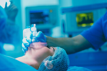 Man surgeon at work in operating room