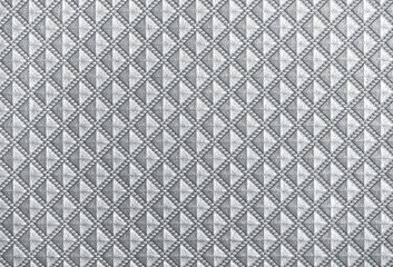 Ultimate Gray color of the year 2021. Vintage background with small symmetrical gray rhombus.