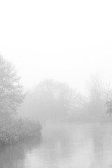 Fototapeta na wymiar River in autumn fog