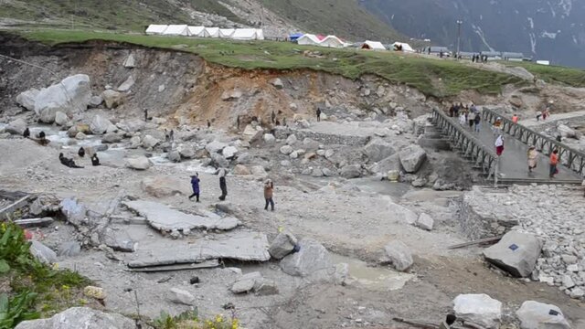After Disaster in kedarnath temple 2013 life started again in 2014 . Cloud burst killed at least 20 thousand people and hundred of people still missing . High quality Full HD footage