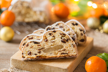 Traditional European German Christmas homemade Stollen with festive decoration