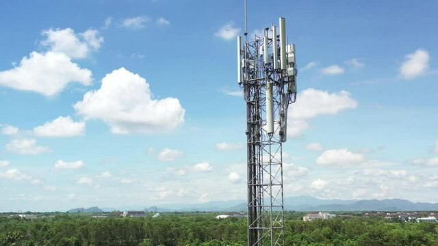 Footage 4k B-roll Aerial drone view of tower antennas Telecommunication cell phone, radio transmitters of cellular 5g 4g mobile and smartphones