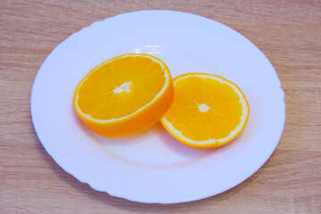 a piece of orange and pills