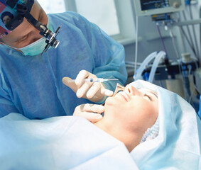 Man surgeon at work in operating room