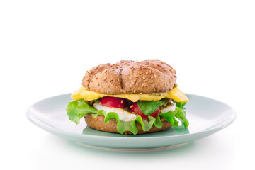 Burger on plate isolated on white