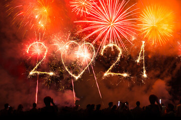 Obraz premium 2021 new year party written with fireworks as a background