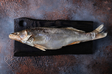 Sun dried salty fish. Studio photo.