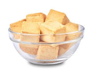 close-up of a pile of diced fish tofu in glasses bowl isolated white background with clipping path