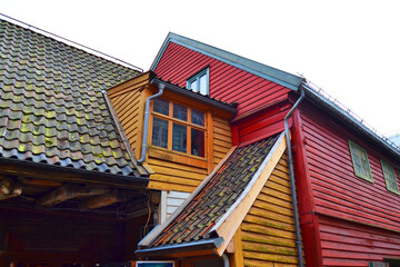 Traditional wooden colorful houses with tile roofs in Bergen, Norway. 