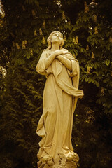 Ancient statue of Mary Magdalene praying (Faith, religion, faith, God concept)