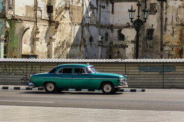 Cuba Old green car on the streets of Havana