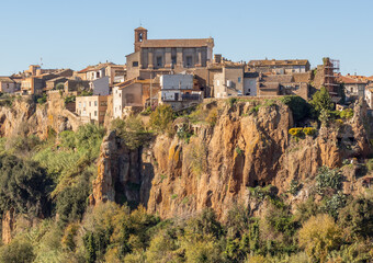 Fototapeta premium Castel Sant'Elia - located on a scary cliff and famous for its wonderful basilica, Castel Sant'Elia is among the most notable villages in central Italy. Here a glimpse of the houses over the cliff