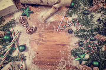 Christmas wooden background with snow fir tree. View with copy space