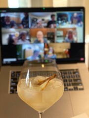 cocktail and socially distanced friends on a virtual call