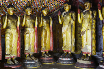Ancient statues at Dambulla cave temple in Sri Lanka.