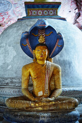 Ancient statues at Dambulla cave temple in Sri Lanka.
