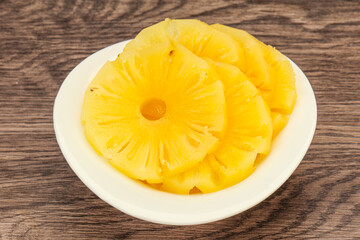 Marinated pineapple rings in the bowl