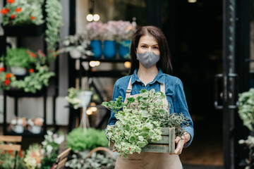 Plant care, gardener work, flower studio and new normal during covid-19 quarantine