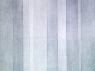 Grey white layered translucent plastic strips create abstract background