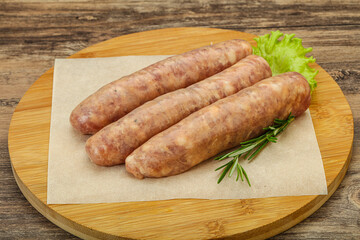 Raw pork meat sausages for grill