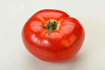 Ripe big juicy red tomato