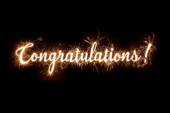 Congratulations in dazzling sparkler effect on dark background