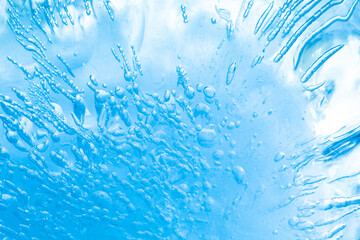 A piece of frozen ice floe with a unique pattern and frozen air bubbles inside. Macro view ice...