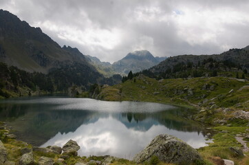 Mountain lake and bad weather in the alps