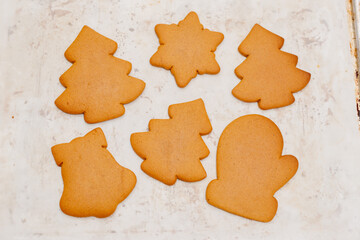 Gingerbread. The process of making homemade Christmas gingerbread. The woman bakes and decorates Christmas gingerbread.