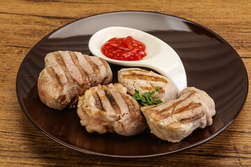 Grilled pork tenderlion with tomato sauce